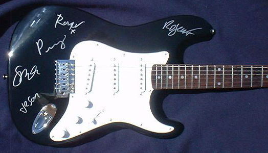 Signed Guitar (Jason, Perry, Robert, Roger, Simon)